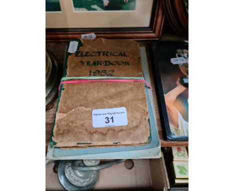 A collection of ephemera including 16 postcards depicting early 20th century motorbikes, the electrical yearbook 1952, a Wode