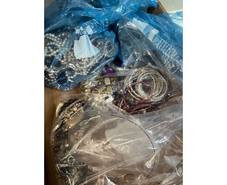 A box containing various items of costume jewellery. 