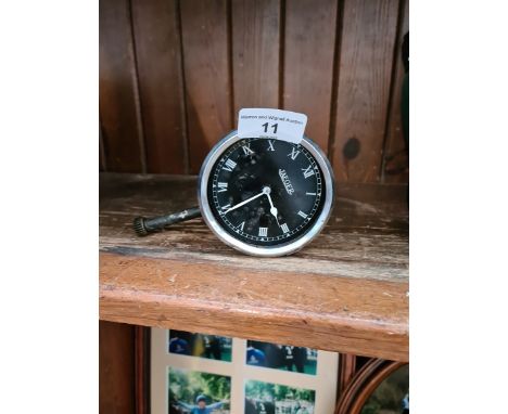 A vintage Jaeger car clock 