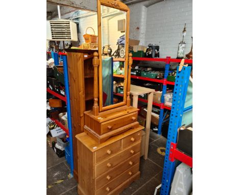 4 items of furniture to include a pine bookcase, pine chest of drawers, pine swivel mirror with drawer and a modern display u