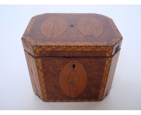 A George III amboyna tea caddy, rectangular with canted corners, inlaid with satinwood marquetry almond shaped panels within 