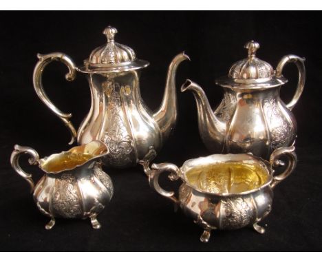 A mid 20th Centuy Danish silver four piece tea and coffee service marked for Copenhagen, makers mark H. G. Y.  Of baluster fo