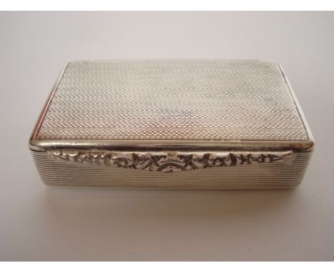 A George V silver box, London, 1927, by Adolph Barsach Davis, of  rectangular form with engine turned decoration and reeded s