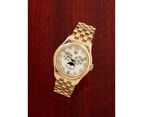PATEK PHILIPPE, ANNUAL CALENDAR, REF. 5036/1AN 18 CARAT GOLD CALENDAR BRACELET WATCH WITH MOONPHASE AND POWER RESERVE INDICAT