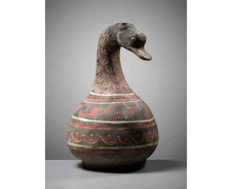 A DUCK-HEADED PAINTED POTTERY VESSEL, HAN DYNASTYChina, 2nd century BC to 2nd century AD. The bulbous body raised on a spread