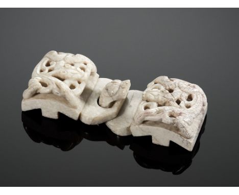 A CHICKEN BONE JADE 'CHILONG' BELT HOOK AND BUCKLE, MING DYNASTY  China, 16th-17th century. Each of rectangular form and carv