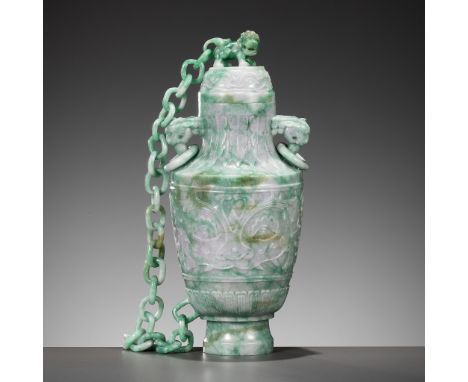 A LAVENDER AND APPLE GREEN JADEITE 'CHAIN' VASE AND COVER, EARLY 20TH CENTURYChina. The translucent stone is of a fine apple 