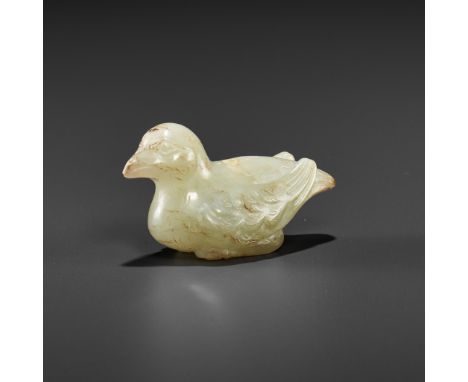 A CELADON JADE 'BIRD' PENDANTJade. China, Six Dynasties (3rd - 6th century AD) to Tang dynasty (618-907)Carved as a bird with