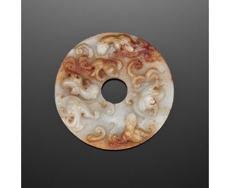 A SPLENDID WHITE JADE BI-DISC WITH CHILONG, HAN DYNASTYChina, Han dynasty, c. 2nd - 1st century BCCarved from splendid white 