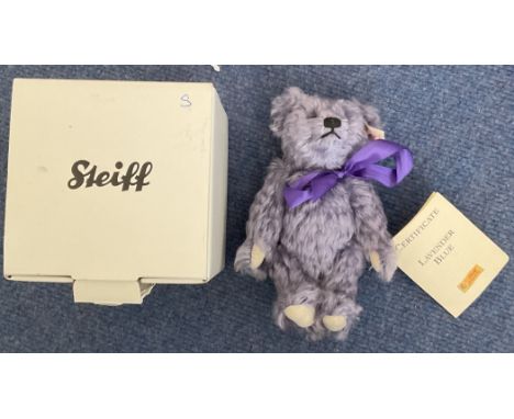 Steiff Teddy Bear limited edition 02587. Lavender blue 16cm. Come with original box. With purple ribbon around the neck. Whit