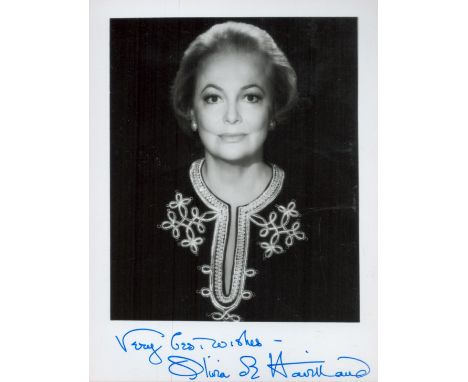 Olivia De Havilland signed 6 x 4-inch b/w portrait photo. Good condition. All autographs come with a Certificate of Authentic
