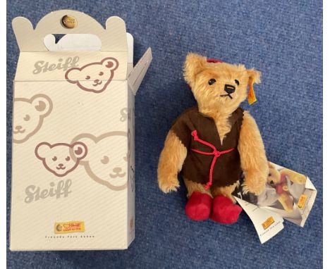 Steiff Classic Teddy Bear 2002 With red hat and boots and brown robe with red rope. Come with original box. Yellow and red ea