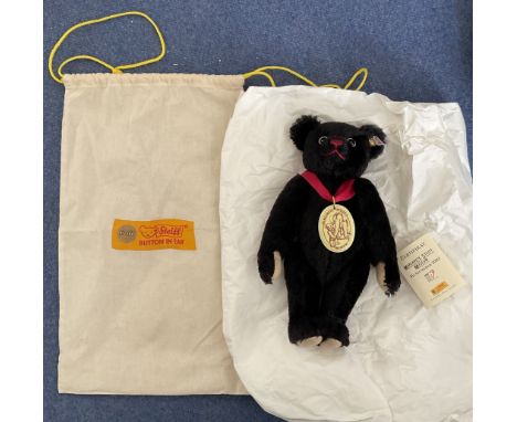 Steiff Museum 2002 Teddy bear. The fifth edition. No 01355 Black Museum bear fully jointed. With bag. Has red ribbon round th