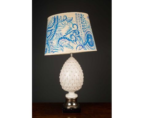 A white glazed pottery table lamp of pineapple form with a silver plated base, 58cm high to the fitting together with a hand 