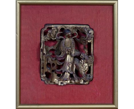 Two 19th century Chinese carved panels, the carved giltwood depicting a female figure and mythical beast on one, and a scroll