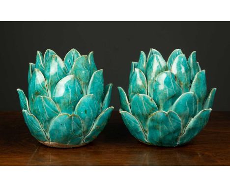 A pair of turquoise ceramic candle holders of vegetal form, 15cm highCondition report: Candleholders with crazing to the glaz