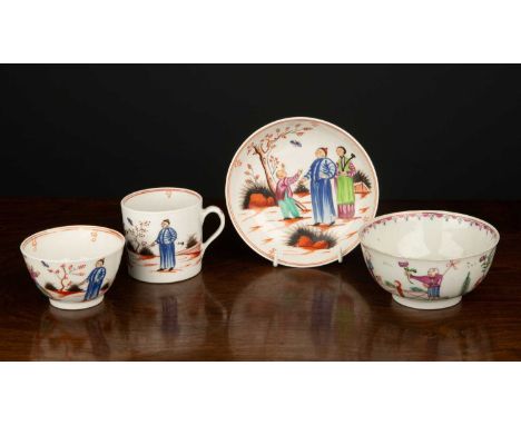 An 18th century New Hall Staffordshire 'Boy and the Butterfly' pattern tea bowl 8.5cm diameter, saucer 13.5cm diameter and co