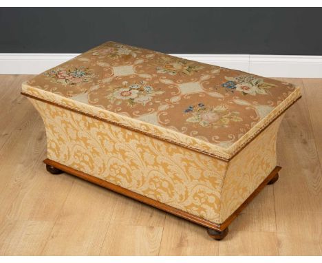An ottoman stool manufactured by Crowe &amp; Sons St Stephens Street Norwich, with tapestry embroidered top, the lift top ove