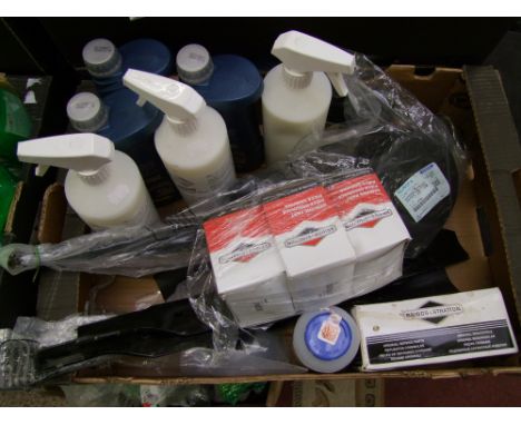 A collection of tractor and agricultural items: Briggs and Stratton service parts, mower blades, chainsaw oil etc. 
