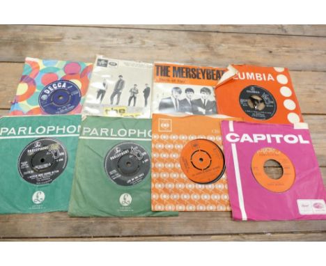 A collection of 1950'/ 60s 45rpm &amp; Ep's Beat Theme Singles to include: Rolling Stones, Animals EP,  Mersey Beat EP etc 