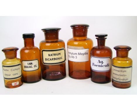 Six vintage brown glass pharmacy jars with lids: 