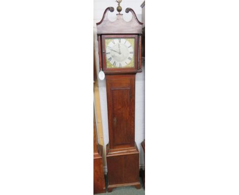 A 30 hour striking mid Victorian long case clock in oak cross banded in mahogany with an ebony and boxwood feather trim and r