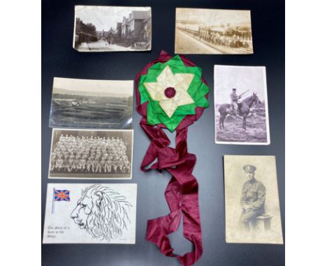 A silk rosette in Suffragette colours, together with seven postcards - steam train at station with crew and staff real photog