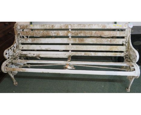 Garden bench with Coalbrookdale cast iron ends, painted white, some remaining wooden slats, requires restoration, height 82cm