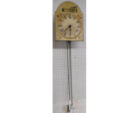 A Victorian chain driven wall clock by L Humphries (?) of Oxford. The open wooden dial has a Roman chapter with a five minute