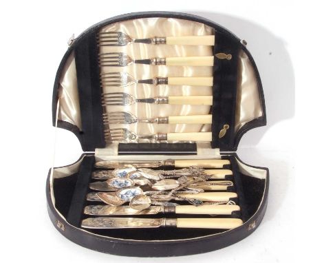 Cased part set of five pairs of George V fish eaters with foliate engraved blades and composition handles, Sheffield 1921 and