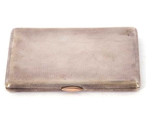 Art Deco silver cigarette case having overall engine turned decoration, push in gold coloured clasp, opening to a gilt interi