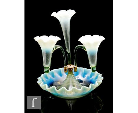 A late 19th Century Stourbridge Straw opal epergne, the frilled circular bowl supporting a single flared trumpet with crimped