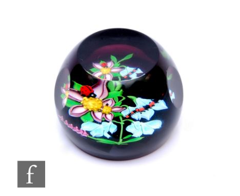 A later 20th Century William Manson for Caithness glass paperweight of domed form with facet cut sides and top, in the Nature
