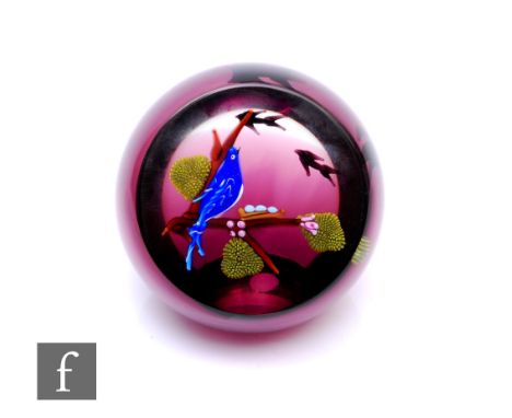 A later 20th Century William Manson for Caithness glass paperweight of domed form with facet cut top, in the Nesting Bluebird