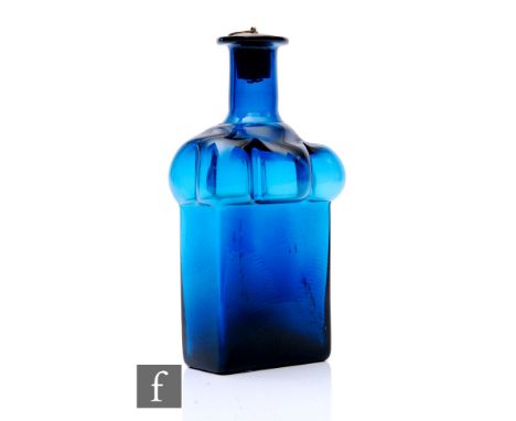 A post war Swedish decanter designed by Bertil Vallien for Boda Afors, the rectangular base rising to a swollen bubble form s