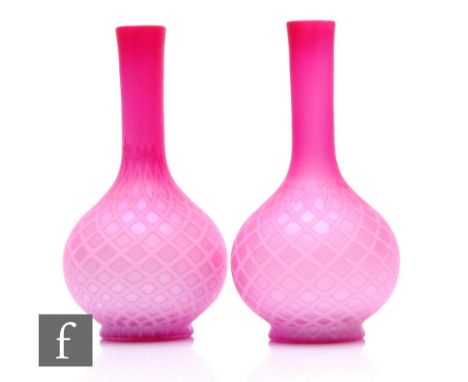 A pair of late 19th Century quilted satin air trap vases of globe and shaft form, diamond air trap on graded pink ground over