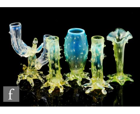 A collection of late 19th Century John Walsh Walsh straw opal rustic posy vases, including a twin tubular thorned branch bud 
