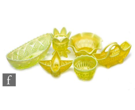 A collection of late 19th Century North East pressed pearline glass&nbsp;including Davidsons Primrose Opal, comprising a boat