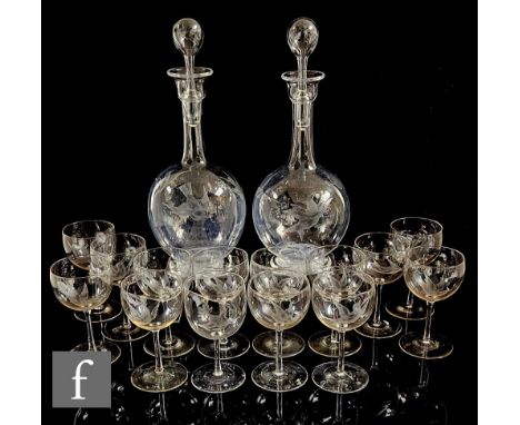 A late 19th Century James Powell &amp; Sons drinks suite designed by Harry Powell, comprising a pair of footed globe and shaf