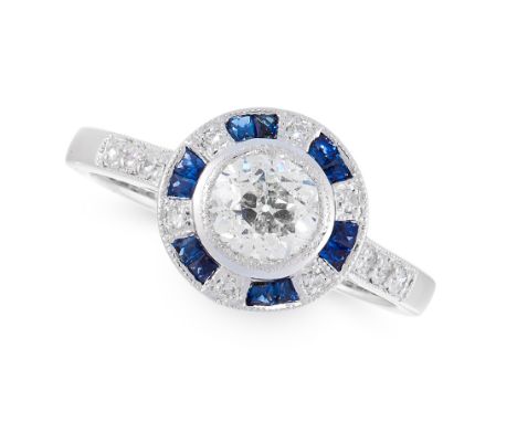 A DIAMOND AND SAPPHIRE TARGET RING in 18ct white gold, set with an old cut diamond of 0.76 carats in a border of alternating 