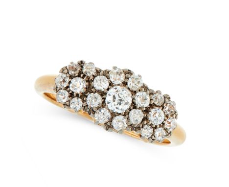 AN ANTIQUE DIAMOND DRESS RING in 18ct yellow gold, set with a trio of clusters of old cut diamonds, marked indistinctly, size