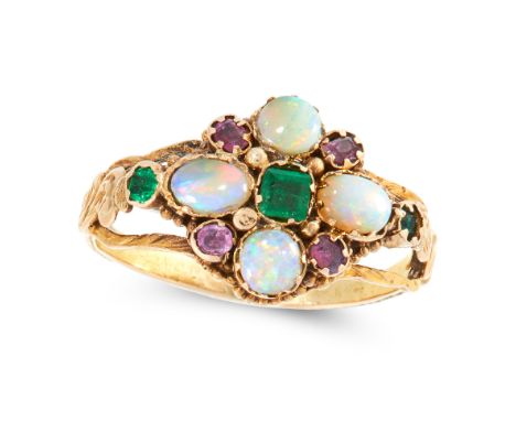 AN ANTIQUE EMERALD, OPAL AND GARNET DRESS RING, 19TH CENTURY in yellow gold, set with a trio of graduated emerald cut emerald