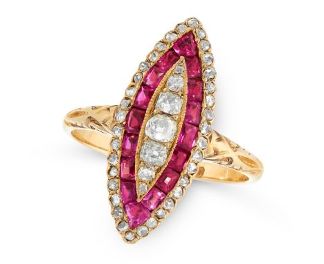 AN ART DECO DIAMOND AND RUBY DRESS RING, EARLY 20TH CENTURY in 18ct yellow gold, the marquise shaped face set with concentric