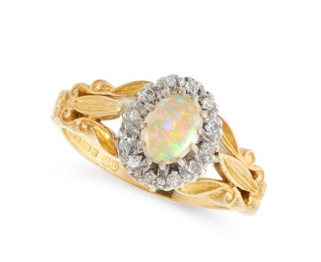 A VINTAGE OPAL AND DIAMOND DRESS RING in 18ct yellow gold, set with an oval cabochon opal, within a border of single cut diam