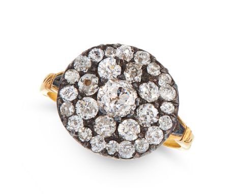 AN ANTIQUE DIAMOND DRESS RING, CIRCA 1800 in yellow gold and silver, the circular face set with a cluster of old cut diamonds