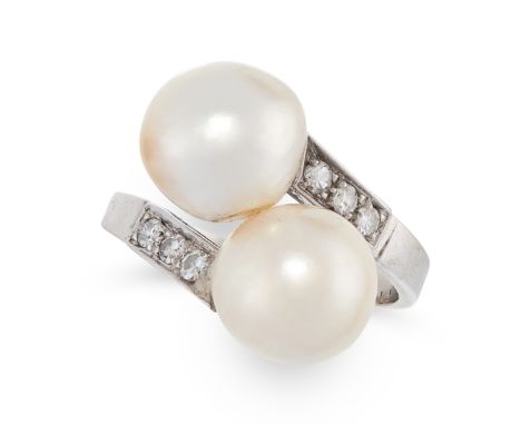 A PEARL AND DIAMOND DRESS RING in 18ct white gold, the twisted band of toi-et-moi design, set with two pearls of 10.2mm and 9