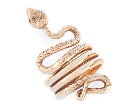 A DIAMOND SNAKE RING in yellow gold, designed as a snake coiled around on itself, set with single cut diamond eyes, unmarked,