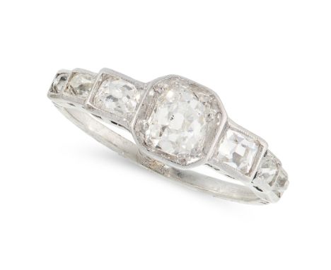 A DIAMOND DRESS RING set with a principal old cut diamond of 0.92 carats, within a row of six further graduated old cut diamo