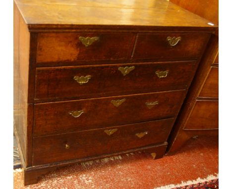 An 18th Century oak chest with two short and three long drawers on bracket feet, in two sections 87cm wide 