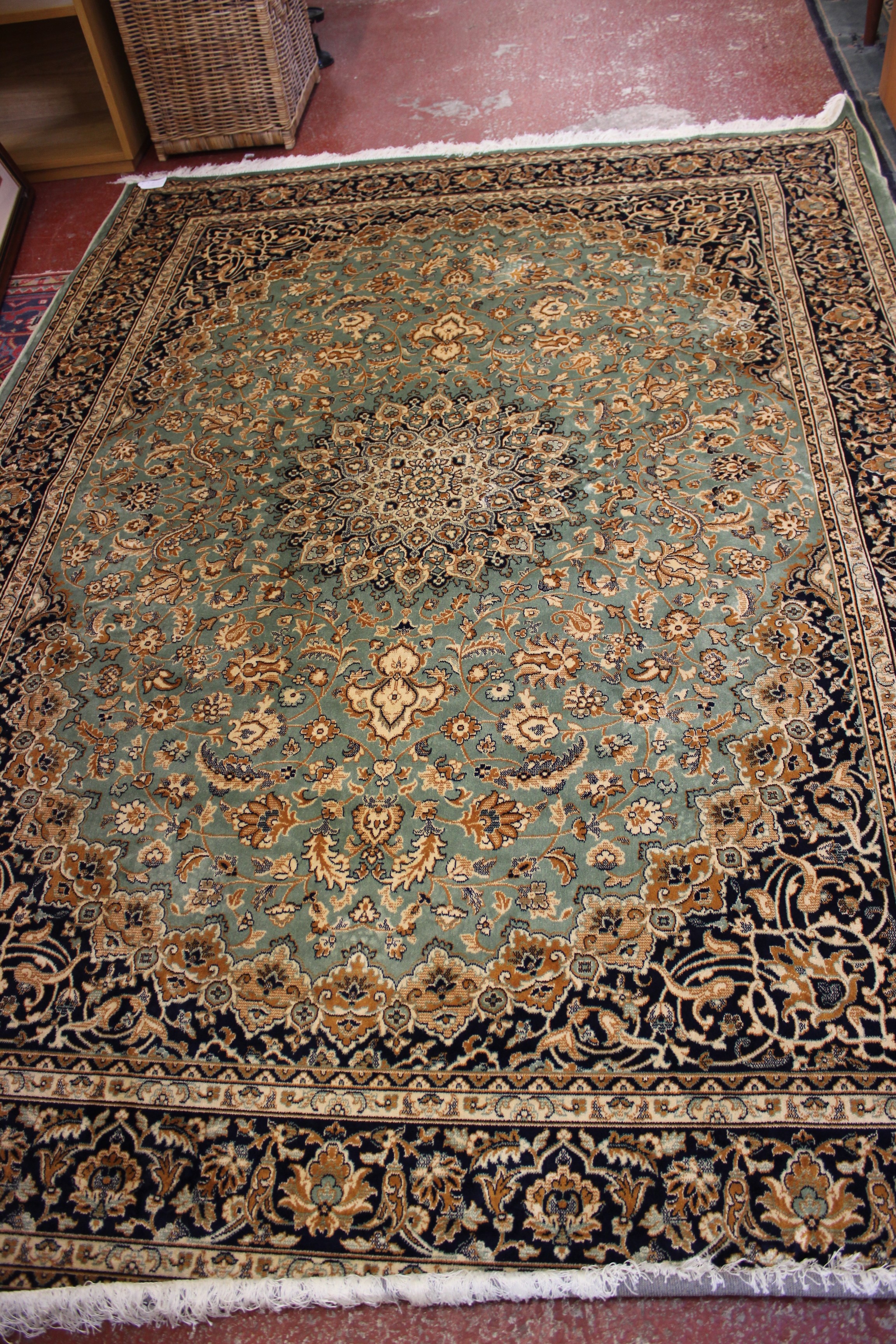 A green ground Kashan carpet 280 x 200cm